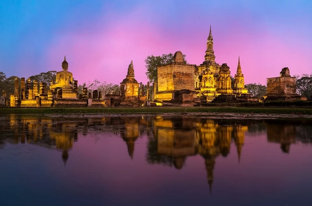 At the Temple of Wealth in Thailand, even the king kneels and the merit chest supports electronic payments